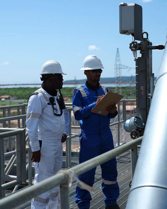 Two NFE employees working on LNG terminal 