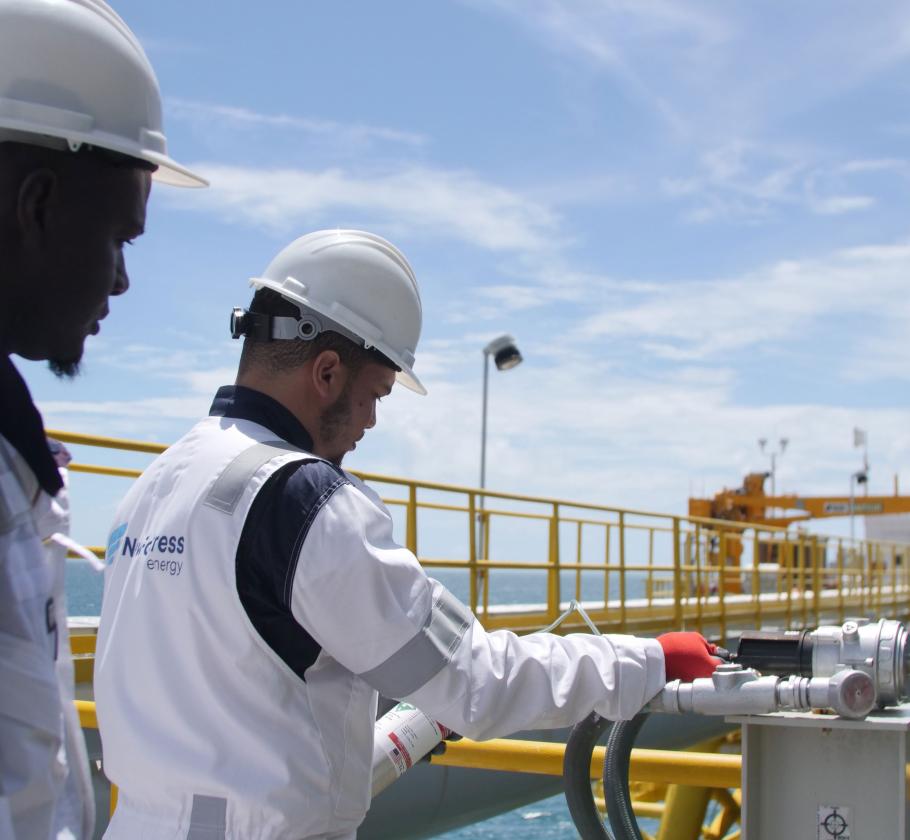 Two NFE employees working on LNG terminal 