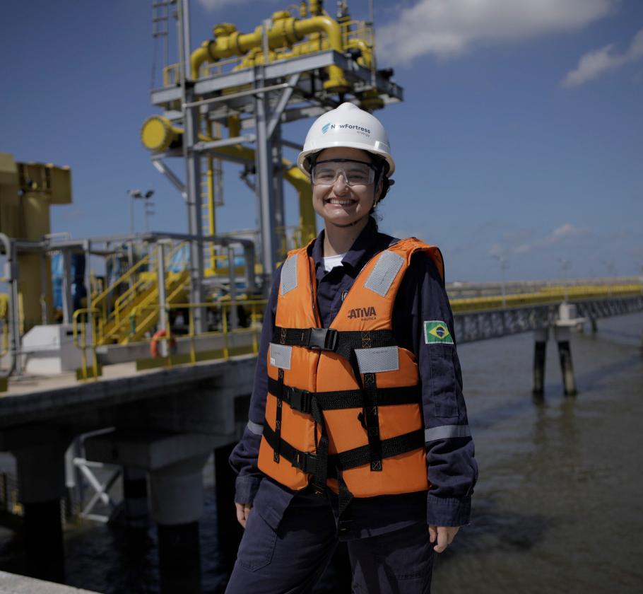 NFE employee standing on LNG plant 