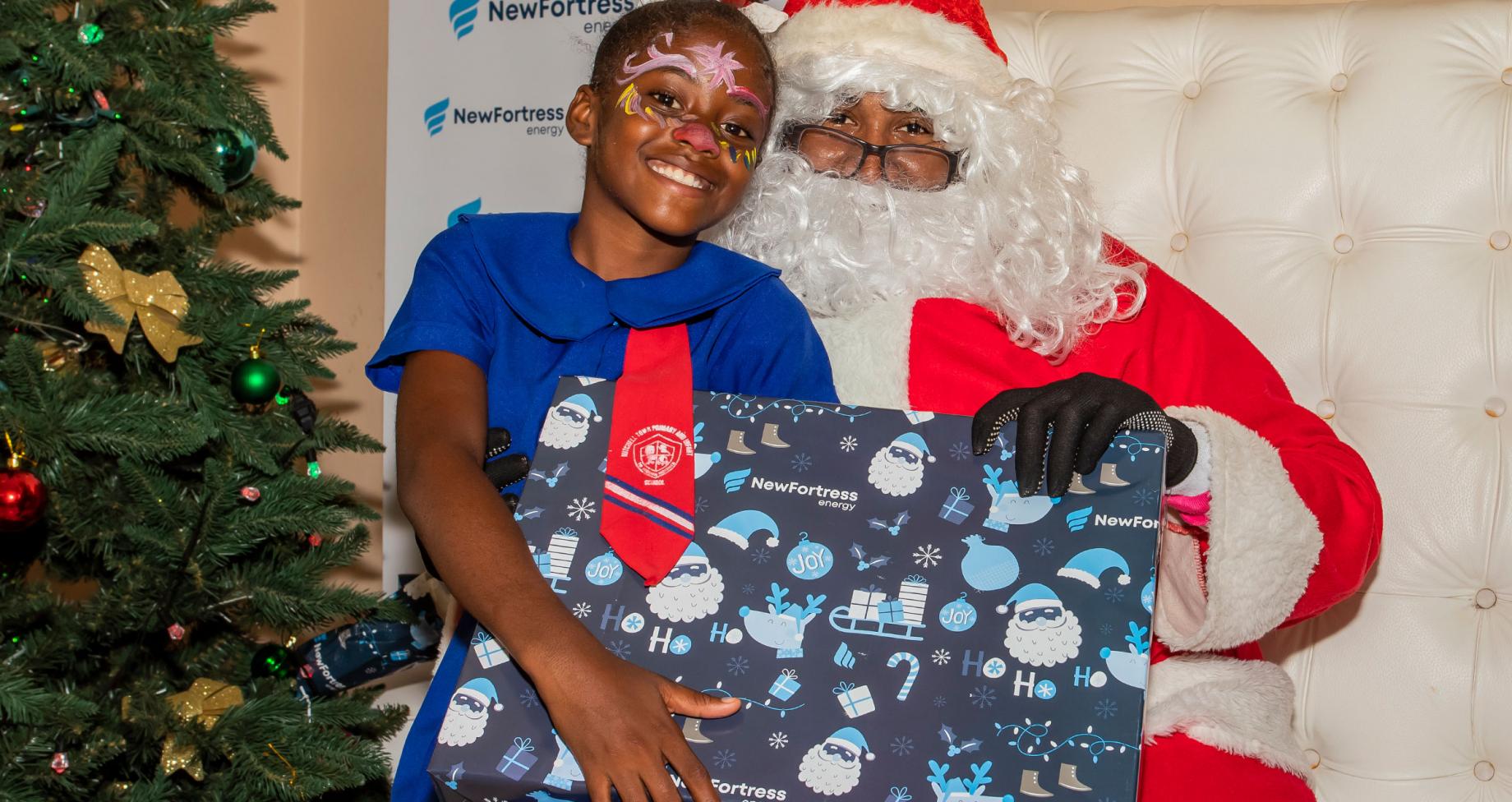Young girl receiving a gift