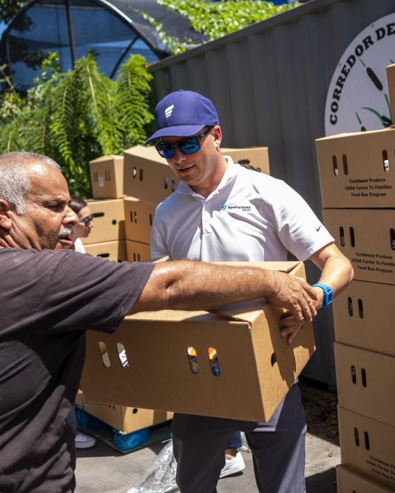 NFE employee helping 