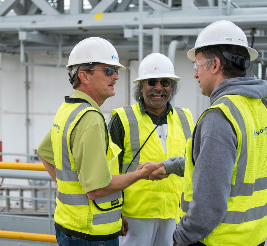 New Fortress employees shaking hands