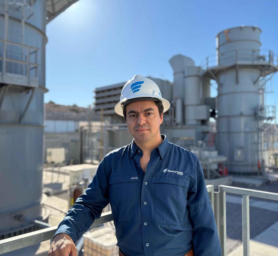 NFE employee standing on LNG plant 