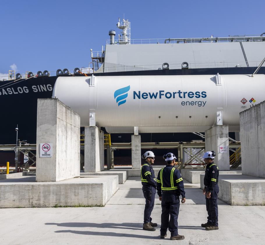 NFE employee standing on LNG plant 